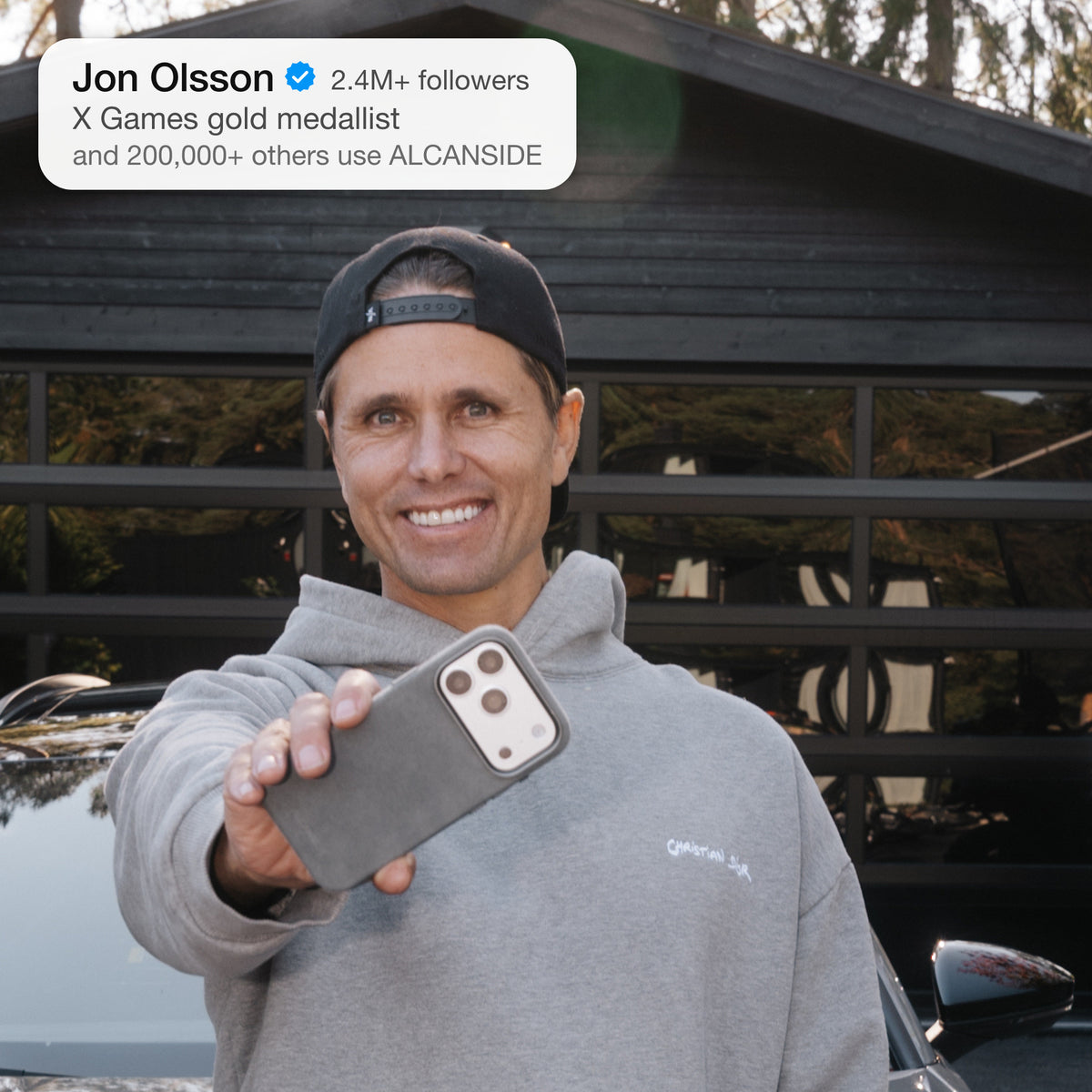 Jon Olsson holding the Nardo Gray ALCANSIDE Alcantara case