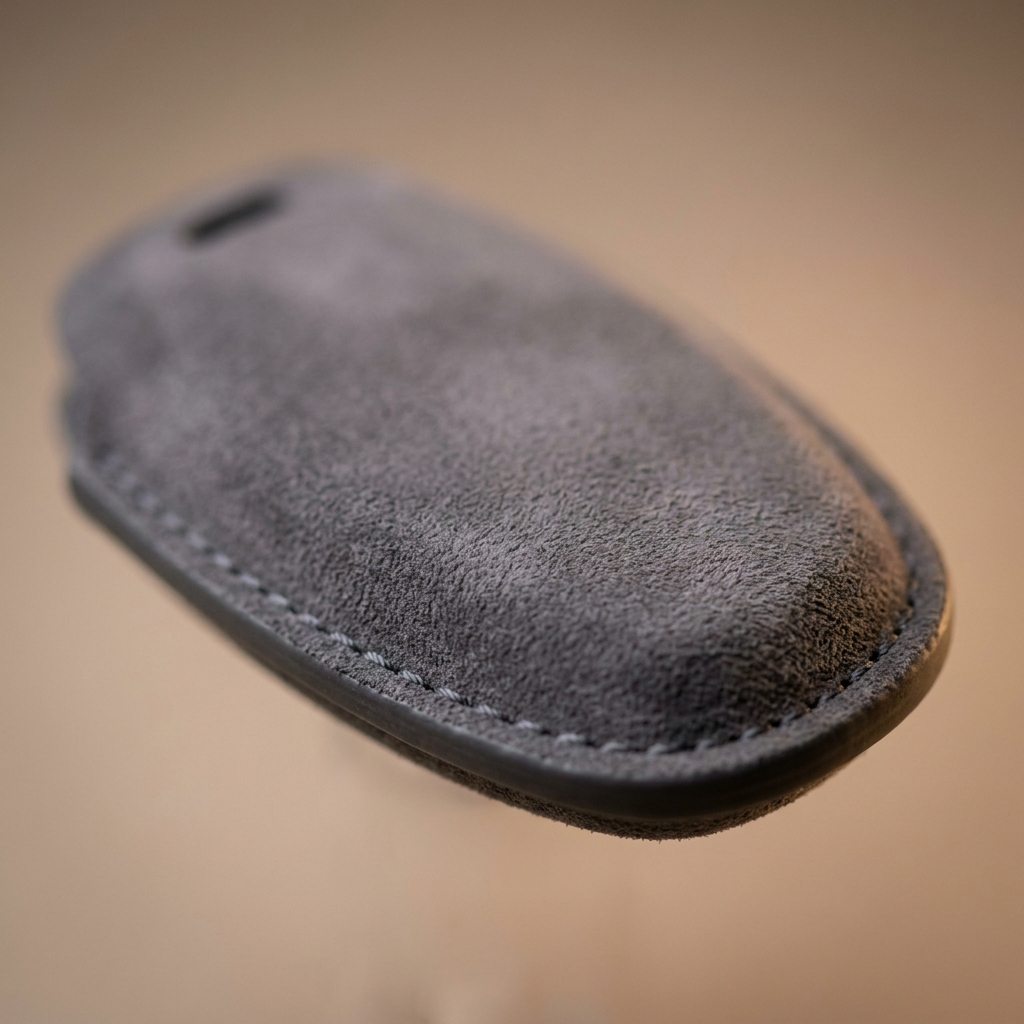 Macro detail of the Alcantara texture and stitching