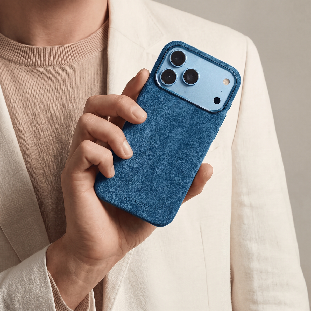 Ocean Blue Alcantara case for iPhone 18 Pro held in hands #iPhone model:_iPhone 18 Pro|iPhone 18 Pro Max